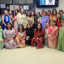 Elementary staff dressed in traditional attire to celebrate Diwali