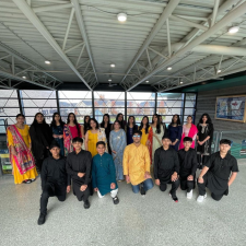 Secondary students gathered for a photo dressed in traditional attire to celebrate Diwali
